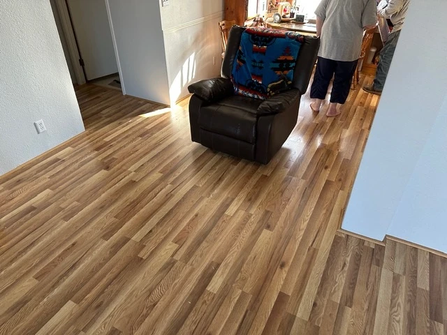 Vinyl plank flooring laid through an open living room