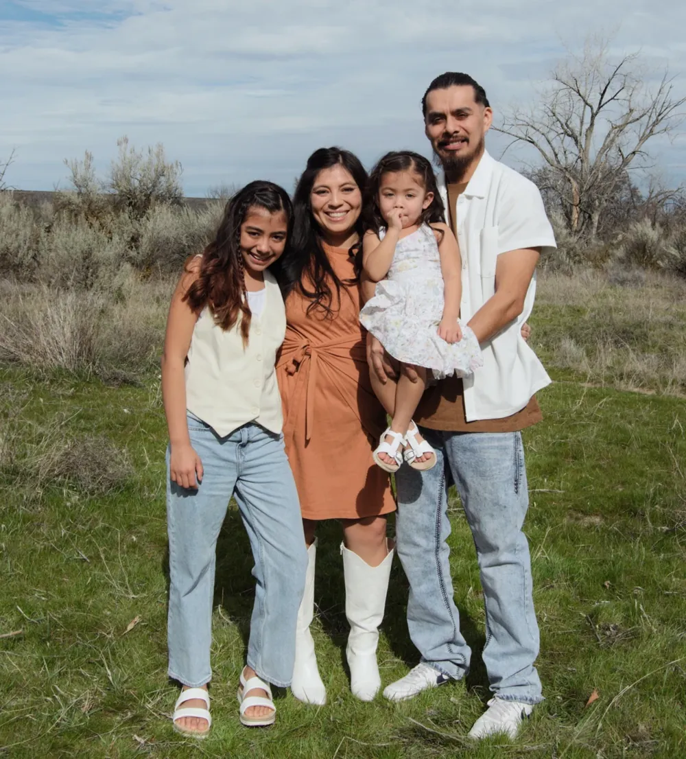 Pablo Salgado with his wife and two daughters